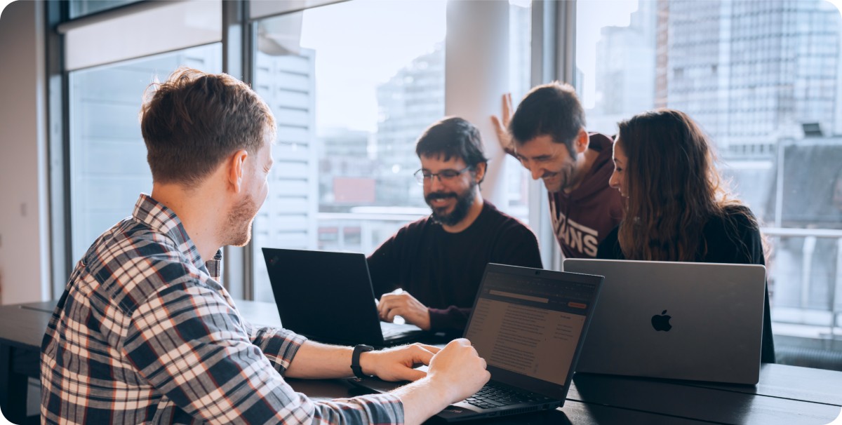 Colleagues collaborating in office
